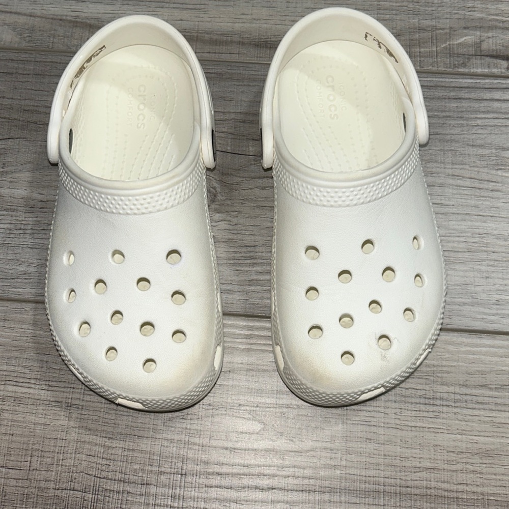 Girl white Crocs in size 11